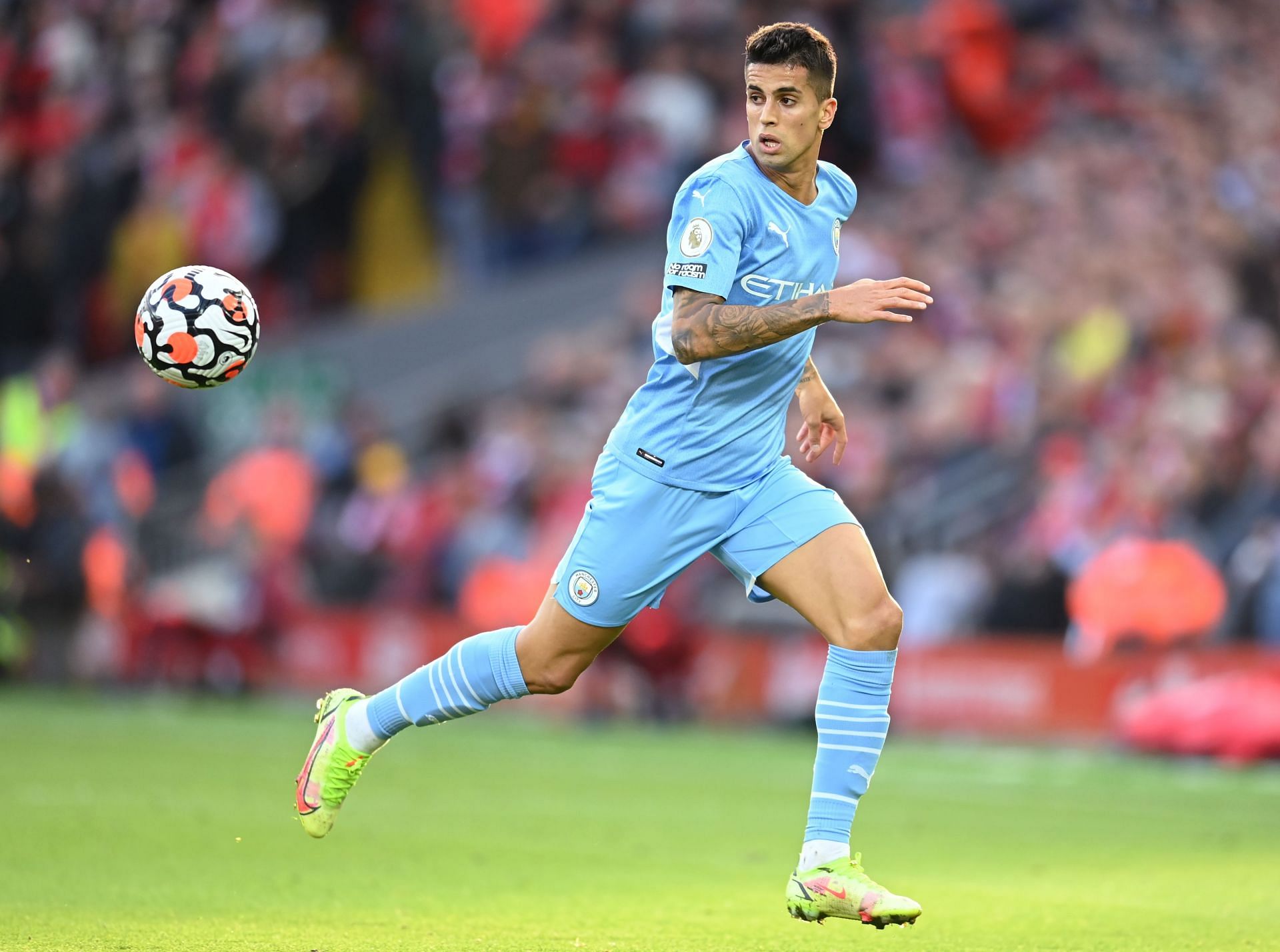 Joao Cancelo in action during Liverpool v Manchester City in the Premier League